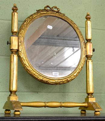 Lot 1287 - Gilt toiler mirror with ribbon tied surmount