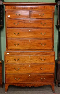 Lot 1290 - A 19th century inlaid mahogany chest on chest