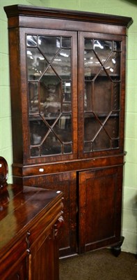 Lot 1298 - A 19th century oak astragal glazed standing corner cabinet