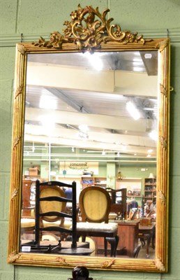 Lot 1300 - A 19th century gilt framed rectangular mirror with leaf and scroll surmount (a.f.)