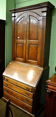 Lot 1301 - George III oak bureau bookcase