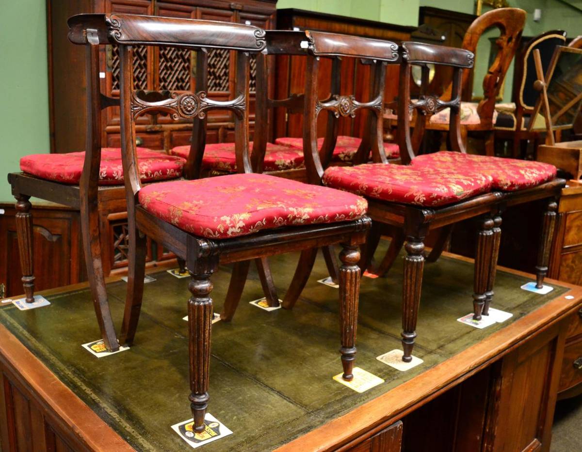 Lot 1307 - Set of eight Regency rosewood cane seated dining chairs with stuffed over-seats