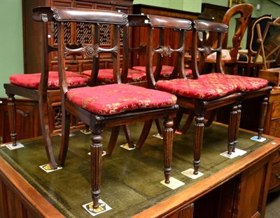 Lot 1307 - Set of eight Regency rosewood cane seated dining chairs with stuffed over-seats