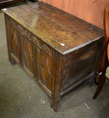 Lot 1329 - Early 19th century Provincial oak three-panelled coffer, carved with the initials E H, with lunette