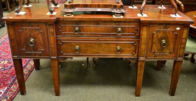 Lot 1334 - A 19th century mahogany inverted breakfront sideboard