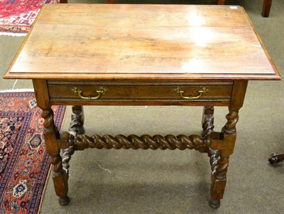 Lot 1335 - An oak side table, with single drawer, on barley turned supports