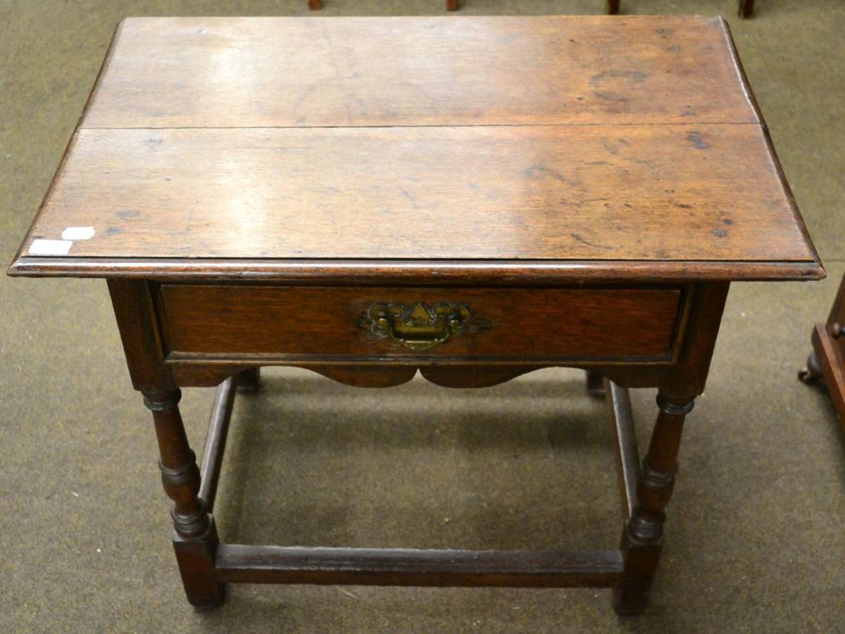 Lot 1337 - An 18th century oak side table