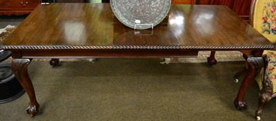 Lot 1339 - A Victorian wind out mahogany dining table on ball and claw feet