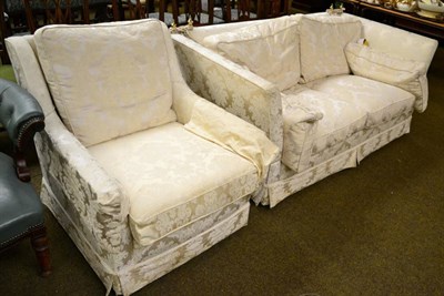 Lot 1350 - Knoll style drop end sofa upholstered in cream floral fabric; and an armchair upholstered to match