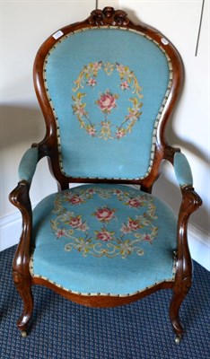 Lot 1359 - ~ A Victorian upholstered spoon back armchair