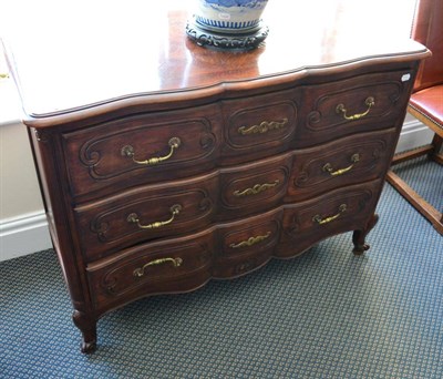 Lot 1380 - ~ An early 20th century French Provincial three height chest of drawers