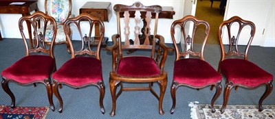 Lot 1383 - A set four rosewood dining chairs, together with a 19th century mahogany elbow chair (5)