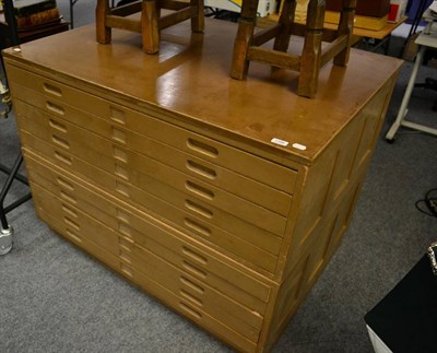 Lot 1396 - A painted wood ten drawer two tier plan chest