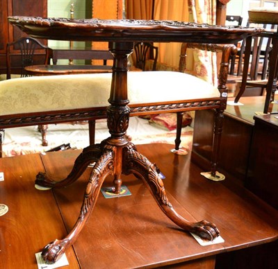 Lot 1423 - ~ A modern Georgian style tripod table