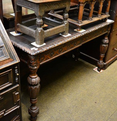 Lot 1430 - A Victorian carved oak table