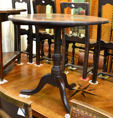 Lot 1434 - George III oak tilt-top tripod table