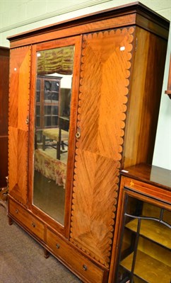 Lot 1443 - Mahogany mirrored triple wardrobe