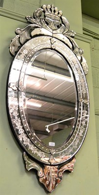 Lot 1452 - A Venetian style oval mirror