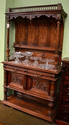 Lot 1465 - ~ A 19th century French marble topped carved walnut buffet