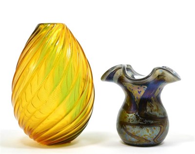Lot 8 - Vetreria Archimede Seguso for Murano, an orange lustre writhen glass vase, 18cm; together with...