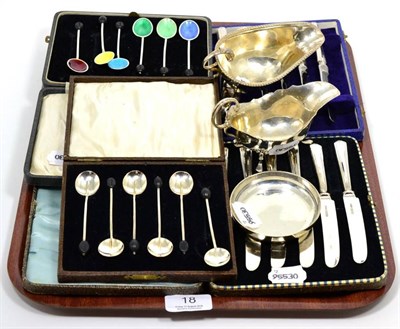 Lot 18 - A cased set of six silver and guilloche enamel coffee bean spoons, Birmingham; with another...