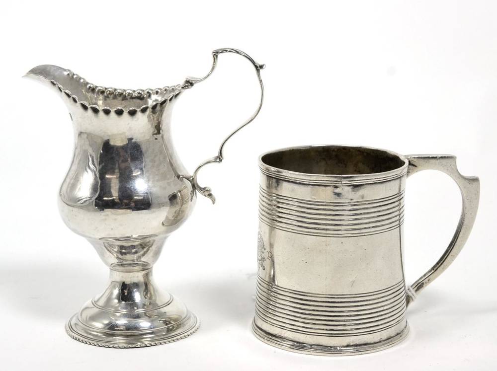 Lot 61 - A George III silver Christening mug, maker indistinct London 1802, with reeded bands; and a...