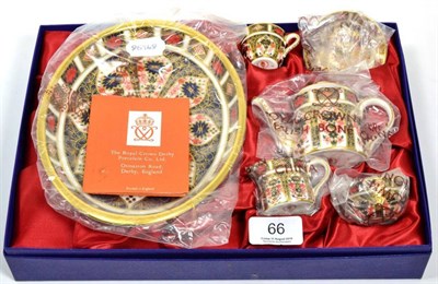 Lot 66 - A Royal Crown Derby Imari pattern miniature tea service, original box
