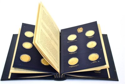 Lot 76 - An album of Churchill centenary medals, in silver gilt, limited edition no 157