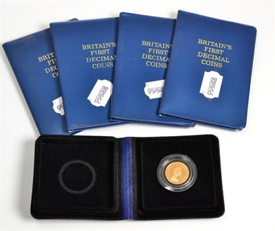 Lot 102 - A 1979 gold sovereign, with four Britain's First Decimal coins set