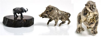 Lot 118 - A miniature silver model of a buffalo by Patrick Mavros, with box; a Continental white metal...