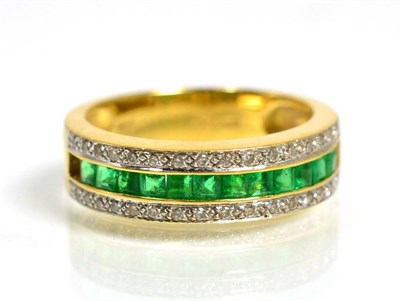 Lot 121 - An 18 carat gold emerald and diamond half hoop ring, a central band of calibré cut emeralds,...