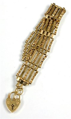 Lot 133 - A 9 carat gold gate link bracelet, with a 9 carat gold padlock clasp, length 17.5cm
