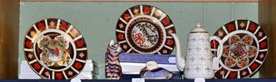 Lot 148 - Five Royal Crown Derby Imari Christmas plates; two Royal Crown Derby Imari paperweights of a...