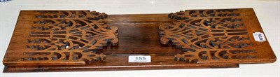 Lot 155 - A 19th century rosewood adjustable book slide with pierced fret work ends