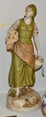 Lot 156 - A Royal Dux figure of a water carrier