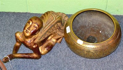 Lot 177 - A Middle Eastern brass bowl and an Indian gilt wood figure of a praying monk