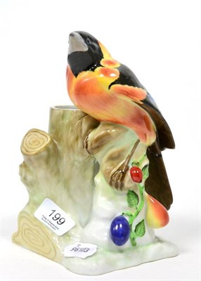 Lot 199 - A Herend porcelain model of a bird on naturalistic base