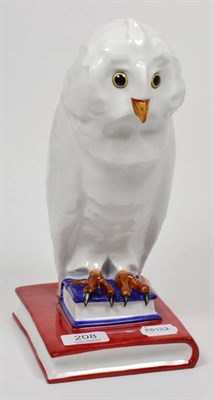 Lot 208 - A Herend porcelain owl perched on two books