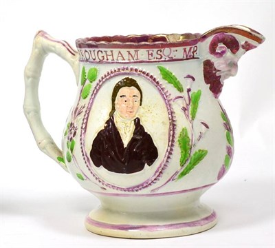 Lot 214 - A Staffordshire lustre mask jug, circa 1820, moulded with bust portraits of H. Brougham and T....