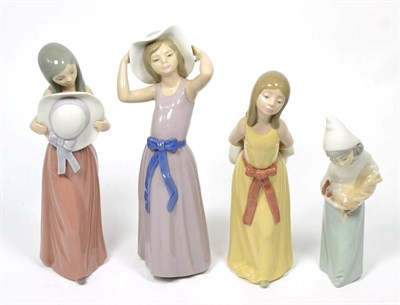 Lot 229 - Four Lladro china figures of young girls