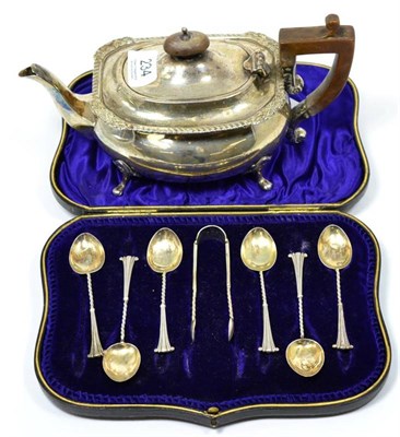 Lot 234 - A silver teapot, Chester; and a set of six silver teaspoons and tongs, 14.1ozt gross