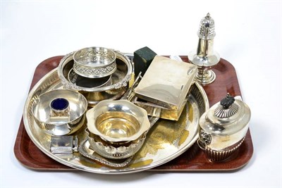 Lot 244 - A group of silver comprising sugar caster, tea caddy, two small bowls and a cigarette box; together