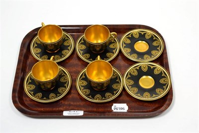 Lot 247 - A set of four Royal Worcester black and gilt tea cups and saucers, with a further two matching...