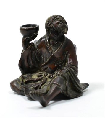 Lot 256 - A Japanese Meiji period bronze of a seated figure