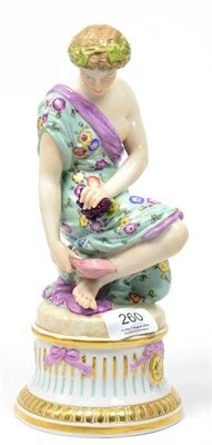 Lot 260 - A Dresden porcelain figure of a seated classical maiden