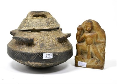 Lot 275 - Ethnographic carved stone circular pot and cover; and an Indian carved marble monkey God panel (2)