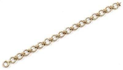 Lot 290 - A 9 carat gold bracelet, of hoop and X links, length 18.5cm