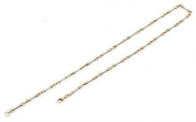 Lot 292 - A 9 carat two colour gold fancy link chain necklace, of white gold bar links, with yellow gold...