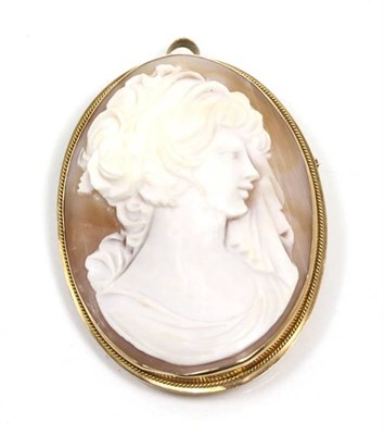 Lot 294 - A Continental shell cameo in 9 carat frame; a 9 carat gold cubic zirconia solitaire ring; and a...