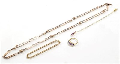 Lot 315 - A 9 carat gold amethyst and diamond pendant, on chain, two graduated oval cut amethyst, spaced...